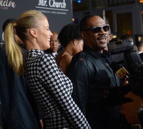 Cast member Eddie Murphy and his girlfriend, Australian actress Paige Butcher attend the premiere of the motion picture drama Mr. Church at the ArcLight Cinema Dome in the Hollywood section of Los Angeles on September 6, 2016. Storyline: Mr. Church tells the story of a unique friendship that develops when a little girl and her dying mother retain the services of a talented cook - Henry Joseph Church. What begins as a six month arrangement instead spans fifteen years, and creates a family bond that lasts forever.  LAP2016090627 JIMxRUYMEN