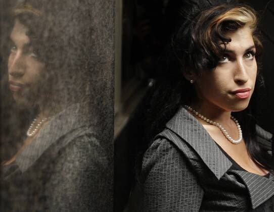 July 23, 2009 - London, UK - Singer Amy Winehouse has been found dead at her flat. The 27-year-old was discovered at the property in north London by emergency services at around 3.54pm this afternoon. FILE PHOTOGRAPH. Photo credit : Shaun Curry LNP  - ZUMAl94_