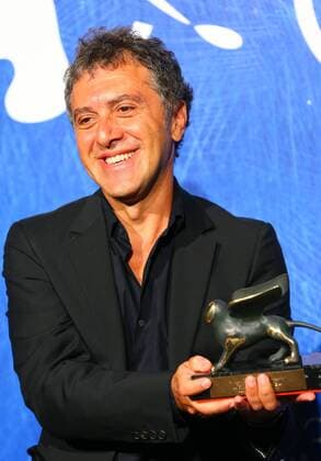VENICE, Sept. 10, 2016 -- Director Reha Erdem poses with the Special Orizzonti Jury Prize for his movie Koca Dunya (Big Big World) during the award winners photocall of the 73rd Venice Film Festival in Venice, Italy, on Sept. 10, 2016. )(axy) ITALY-VENICE-73RD FILM FESTIVAL-AWARD GongxBing 