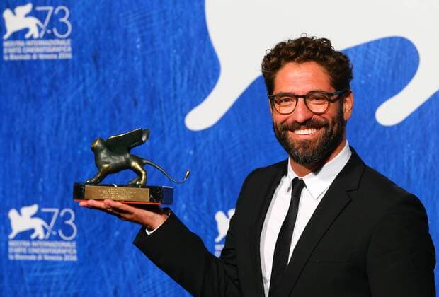 VENICE, Sept. 10, 2016 -- Actor Nuno Lopes poses with the Orizzonti Award for Best Actor for Saint George during the award winners photocall of the 73rd Venice Film Festival in Venice, Italy, on Sept. 10, 2016. )(axy) ITALY-VENICE-73RD FILM FESTIVAL-AWARD GongxBing 