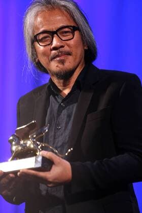 VENICE, Sept. 10, 2016 -- Director Lav Diaz holds the Golden Lion prize for his movie The Woman Who Left during the award ceremony at the 73rd Venice Film Festival, at the Lido of Venice, Italy, Sept. 10, 2016. The Woman Who Left by Philippine director Lav Diaz won the Golden Lion, the highest prize presented at the 73rd Venice International Film Festival which concluded here on Saturday evening. )(axy) ITALY-VENICE-73RD FILM FESTIVAL-AWARD JinxYu 