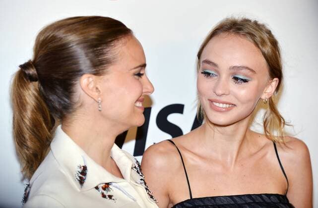 Natalie Portman (L) and Lily-Rose Depp arrive at the Toronto International Film Festival premiere of Planetarium at Roy Thomson Hall in Toronto, Canada on September 10, 2016.  TOR2016091033 CHRISTINExCHEW