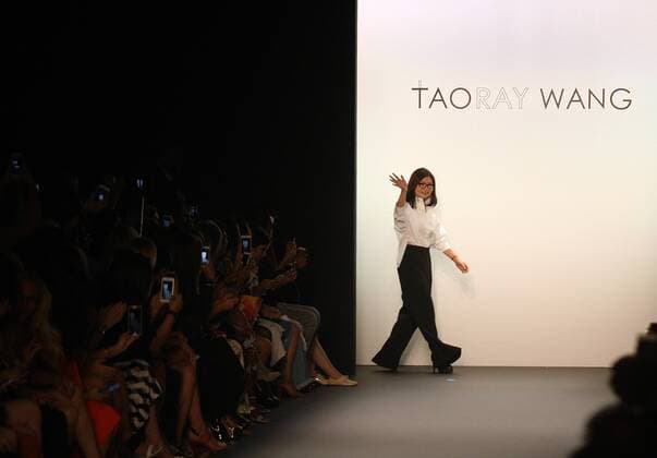 NEW YORK, Sept. 12, 2016 -- Designer Wang Tao greets the audience after the presentation of Taoray Wang Spring Summer 2017 collection during the New York Fashion Week in New York, the United States, Sept. 12, 2016. ) U.S.-NEW YORK-FASHION WEEK-TAORAY WANG WuxRong 
