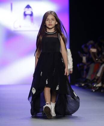 A child model walks on the runway at the Comme Tu Es fashion show during New York Fashion Week: The Shows at The Dock, Skylight at Moynihan Station in New York City on September 13, 2016.  NYP20160913509 JOHNxANGELILLO