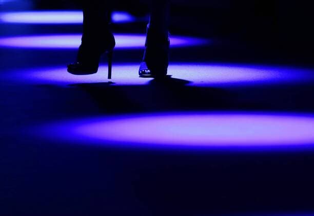 A girl wearing heels stands on the runway before the start of the Comme Tu Es fashion show during New York Fashion Week: The Shows at The Dock, Skylight at Moynihan Station in New York City on September 13, 2016.  NYP20160913514 JOHNxANGELILLO