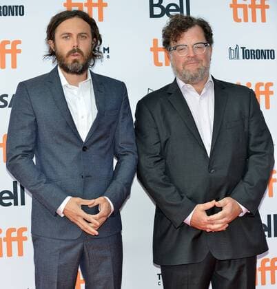 Casey Affleck (L) and director Kenneth Lonergan arrive at the Toronto International Film Festival premiere of Manchester By The Sea at the Princess of Wales Theatre in Toronto, Canada on September 13, 2016.  TOR2016091307 CHRISTINExCHEW