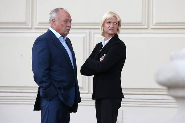 MOSCOW, RUSSIA - SEPTEMBER 13, 2016: CSKA s deputy head, Olympic gymnastics champion Svetlana Khorkina (R) with husband Oleg Kochnov outside Moscow s Bolshoi Theatre where a production of Giuseppe Verdi s opera Simon Boccanegra is to be presented by the Teatro alla Scala (Milan s grand opera house) as part of the 2016 Chereshnevy Les Open Art Festival. Artyom Korotayev TASS  TS03112F