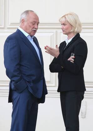 MOSCOW, RUSSIA - SEPTEMBER 13, 2016: CSKA s deputy head, Olympic gymnastics champion Svetlana Khorkina (R) with husband Oleg Kochnov outside Moscow s Bolshoi Theatre where a production of Giuseppe Verdi s opera Simon Boccanegra is to be presented by the Teatro alla Scala (Milan s grand opera house) as part of the 2016 Chereshnevy Les Open Art Festival. Artyom Korotayev TASS  TS031130
