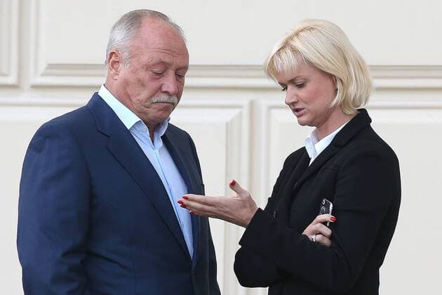 MOSCOW, RUSSIA - SEPTEMBER 13, 2016: CSKA s deputy head, Olympic gymnastics champion Svetlana Khorkina (R) with husband Oleg Kochnov outside Moscow s Bolshoi Theatre where a production of Giuseppe Verdi s opera Simon Boccanegra is to be presented by the Teatro alla Scala (Milan s grand opera house) as part of the 2016 Chereshnevy Les Open Art Festival. Artyom Korotayev TASS  TS031132