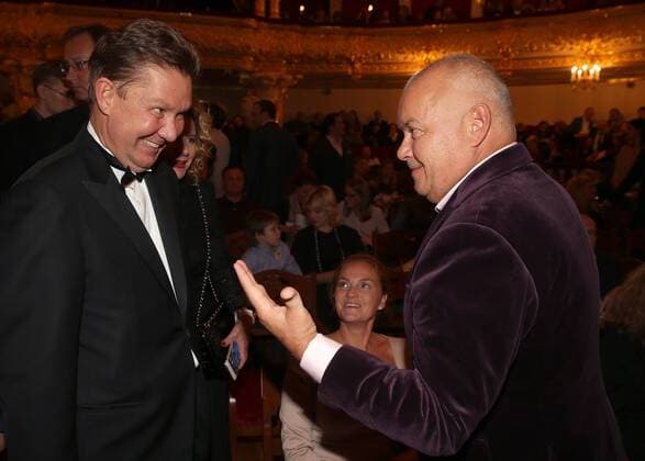 MOSCOW, RUSSIA - SEPTEMBER 13, 2016: Chairman of the board of directors at Gazprom, Alexei Miller (L) and journalist Dmitry Kiselev shake hands at Moscow s Bolshoi Theatre before a production of Giuseppe Verdi s opera Simon Boccanegra presented by the Teatro alla Scala (Milan s grand opera house) as part of the 2016 Chereshnevy Les Open Art Festival. Artyom Korotayev TASS  TS03114C