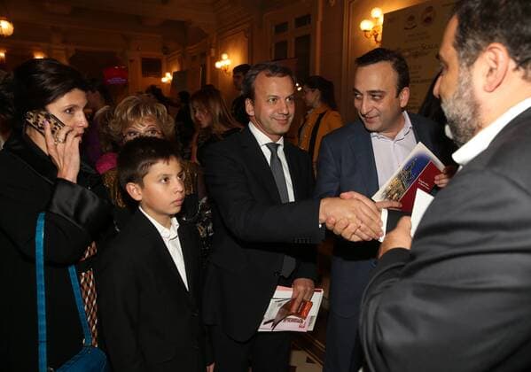 MOSCOW, RUSSIA - SEPTEMBER 13, 2016: Russia s deputy prime minister Arkady Dvorkovich (C) with wife Zumrud Rustamova and son (L), and Russian-Armenian entrepreneur and philanthropist Ruben Vardanyan (R back) at Moscow s Bolshoi Theatre where a production of Giuseppe Verdi s opera Simon Boccanegra is to be presented by the Teatro alla Scala (Milan s grand opera house) as part of the 2016 Chereshnevy Les Open Art Festival. Artyom Korotayev TASS  TS031152