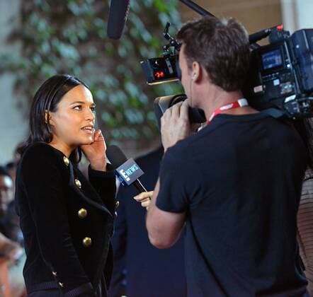 Michelle Rodriguez speaks with television reporters on the red carpet as she arrives at the Toronto International Film Festival premiere of (re)Assignment at Ryerson Theatre in Toronto, Canada on September 14, 2016.  TOR2016091409 CHRISTINExCHEW