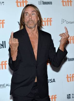 The Stooges legendary frontman Iggy Pop gets irreverent as he arrives at the Toronto International Film Festival premiere of Gimme Danger at Ryerson Theatre in Toronto, Canada on September 14, 2016.  TOR2016091418 CHRISTINExCHEW
