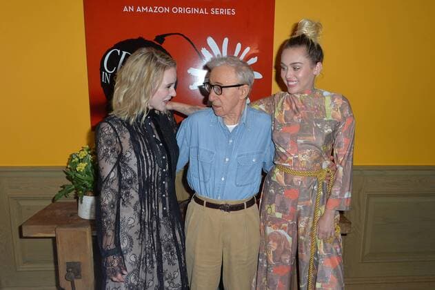 Rachel Brosnahan, Woody Allen and Miley Cyrus pose together at The Crisis in Six Scenes premiere at The Crosby Street Hotel in New York City on September 15, 2016.  NYP201609150702 ANDREAxHANKS