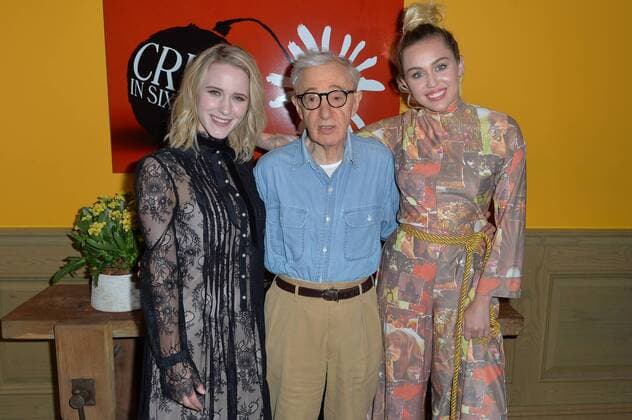 Rachel Brosnahan, Woody Allen and Miley Cyrus pose together at The Crisis in Six Scenes premiere at The Crosby Street Hotel in New York City on September 15, 2016.  NYP201609150703A ANDREAxHANKS