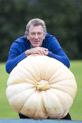 September 16, 2016 - Harrogate, Yorkshire, UK - Harrogate UK. Picture shows Brian Marshall & his prize winning Pumpkin that weighed 139.5 KG at the Giant vegetable competition in Harrogate. The competition see s competitors from across the UK show their biggest Carrot s, Cucumbers, Cabbages, Onion s & Tomatoes competing for the title of heaviest & longest at the Harrogate Autumn Flower Show. Harrogate UK  - ZUMAl94_