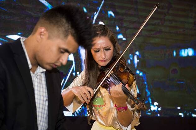 Violinist Elena Mikhailova and Dj Madison during a performance at MBFWM16 in Madrid. September 16, Spain. 2016.  (20160916015)