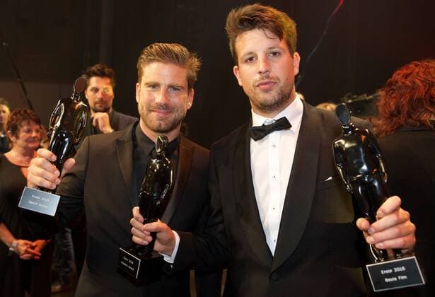 actor Kevin Janssens and Robin Pront pictured during the award ceremony of the Ensors Flemish film prizes on the closing day of the tenth edition of the Oostende Film festival, Friday 16 September 2016.  NICOLASxMAETERLINCK 04933617