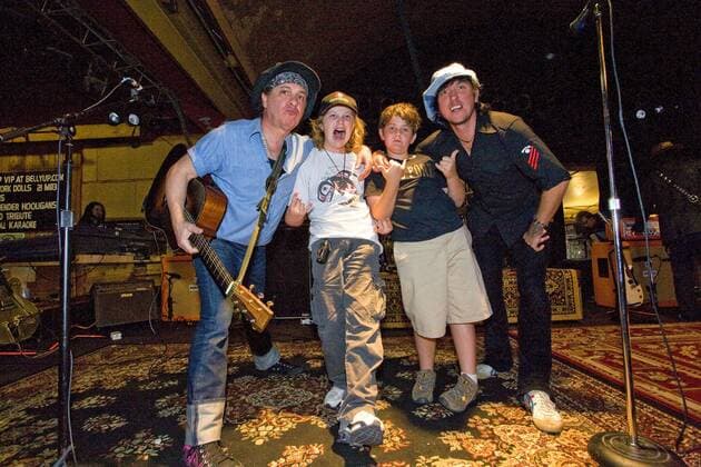 May 20, 2009 - Solana Beach, California, USA - Two San Diego area music students were treated to attending an extended sound check and Meet & Greet with THE NEW YORK DOLLS at The Belly Up Tavern in Solana Beach on May 20, 2009. From left are guitarist SYLVAIN SYLVAIN, 11-year old CHEYNE HAMM, 10-year old DAVID LILBURN, and bassist SAMI YAFFA. - ZUMAkn1_