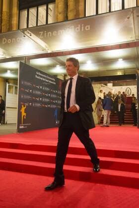 Hugh Grant during the red carpet of the film Florence Foster Jenkins in the 64th San Sebastian International Film Festival on September 18, 2016 in San Sebastian, Spain.  JosexIgnacioxunanue Monica Belucci_64 Zinemaldia