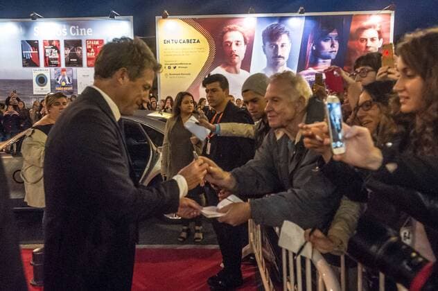 Hugh Grant during the red carpet of the film Florence Foster Jenkins in the 64th San Sebastian International Film Festival on September 18, 2016 in San Sebastian, Spain.  JosexIgnacioxunanue Monica Belucci_64 Zinemaldia