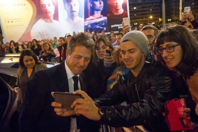 Hugh Grant during the red carpet of the film Florence Foster Jenkins in the 64th San Sebastian International Film Festival on September 18, 2016 in San Sebastian, Spain.  JosexIgnacioxunanue Monica Belucci_64 Zinemaldia