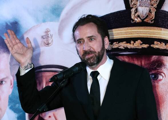 MOSCOW, RUSSIA - SEPTEMBER 20, 2016: American actor Nicolas Cage at the Russian premiere of a new action film, USS Indianapolis: Men of Courage, directed by Mario Van Peebles, at the 5 Zvyozd Na Paveletskoi Cinema Hall. Vyacheslav Prokofyev TASS  TS031D05