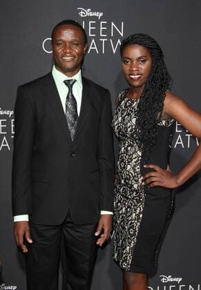 September 20, 2016 - Hollywood, CA, United States - 20 September 2016 - Hollywood, California - Robert Katende and Phiona Mutesi. Ã¢â‚¬Å Queen Of KatweÃ¢â‚¬Â Los Angeles Premiere held at the El Capitan Theater in Hollywood. Photo Credit: AdMedia Hollywood United States - ZUMAa123