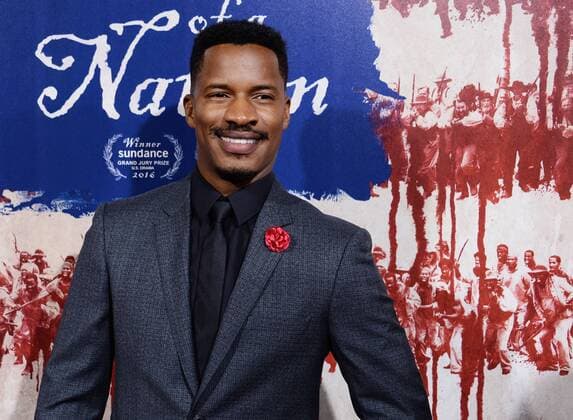 Writer director and cast member Nate Parker attends the premiere of the motion picture drama The Birth of a Nation at the ArcLight Cinerrama Dome in the Hollywood section of Los Angeles on September 21, 2016. Storyline: Nat Turner, a literate slave and preacher in the antebellum South, orchestrates an uprising.  LAP2016092103 JIMxRUYMEN