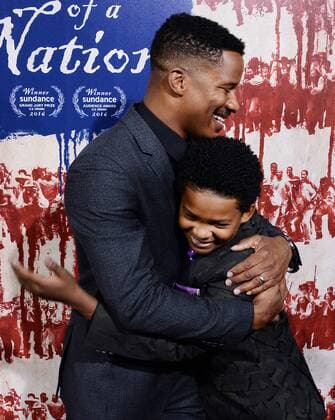 Writer director and cast member Nate Parker (L) and cast member Tony Espinosa attend the premiere of the motion picture drama The Birth of a Nation at the ArcLight Cinerrama Dome in the Hollywood section of Los Angeles on September 21, 2016. Storyline: Nat Turner, a literate slave and preacher in the antebellum South, orchestrates an uprising.  LAP2016092122 JIMxRUYMEN
