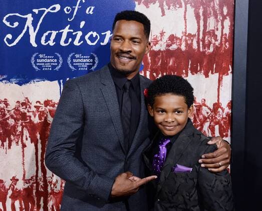 Writer director and cast member Nate Parker (L) and cast member Tony Espinosa attend the premiere of the motion picture drama The Birth of a Nation at the ArcLight Cinerrama Dome in the Hollywood section of Los Angeles on September 21, 2016. Storyline: Nat Turner, a literate slave and preacher in the antebellum South, orchestrates an uprising.  LAP2016092123 JIMxRUYMEN