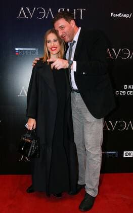 MOSCOW, RUSSIA - SEPTEMBER 21, 2016: Russian actor Maxim Vitorgan (R) and his wife, Russian TV presenter Ksenia Sobchak attend the Moscow premiere of Russian director Alexei Mizgirev s new film The Duelist at the Formula Kino na Kutuzovskom Cinema. Sergei Fadeichev TASS  TS031F4B