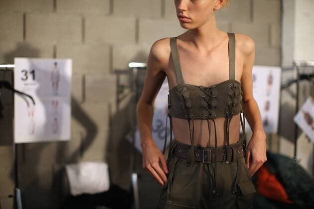 (160923) -- MILAN, Sept. 23, 2016 -- A model has her dress changed backstage of Diesel Black Gold fashion show during Milan Fashion Week Spring Summer 2017 in Milan, Italy, Sept. 23, 2016. )(cl) ITALY-MILAN-FASHION WEEK-DIESEL BLACK GOLD-BACKSTAGE JinxYu 