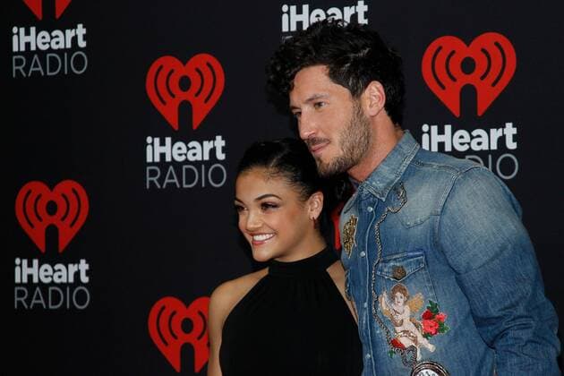 Olympic gymnast Laurie Hernandez and Val Chmerkovskiy arrive for the iHeartRadio Music Festival at the T-Mobile Arena in Las Vegas, Nevada on September 23, 2016.  LVP2016092348 JAMESxATOA
