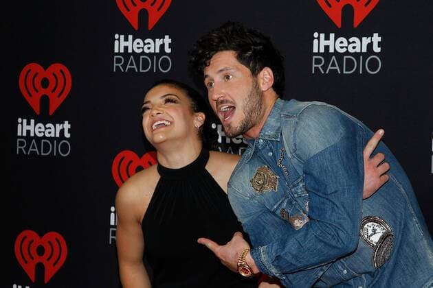 Olympic gymnast Laurie Hernandez and Val Chmerkovskiy arrive for the iHeartRadio Music Festival at the T-Mobile Arena in Las Vegas, Nevada on September 23, 2016.  LVP2016092349 JAMESxATOA