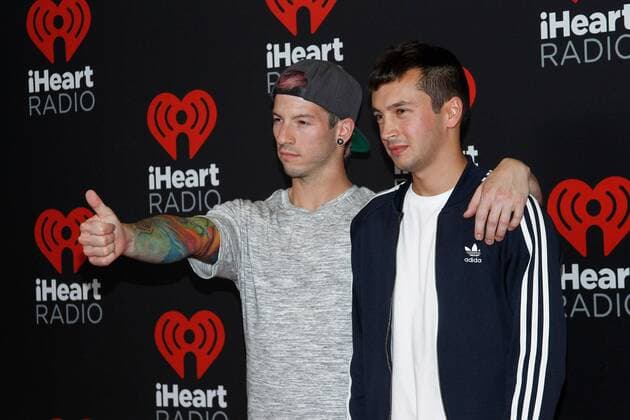 Musical duo Twenty One Pilots arrives for the iHeartRadio Music Festival at the T-Mobile Arena in Las Vegas, Nevada on September 23, 2016.  LVP2016092368 JAMESxATOA