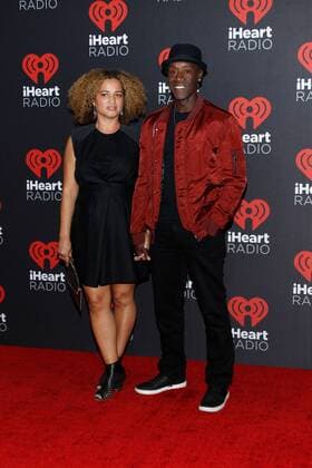 Bridgid Coulter and Don Cheadle arrive for the iHeartRadio Music Festival at the T-Mobile Arena in Las Vegas, Nevada on September 23, 2016.  LVP20160923111 JAMESxATOA
