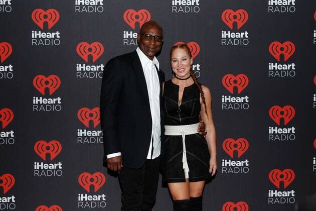 NFL legend Eric Dickerson and his wife Penny Sutton arrive for the iHeartRadio Music Festival at the T-Mobile Arena in Las Vegas, Nevada on September 23, 2016.  LVP20160923127 JAMESxATOA