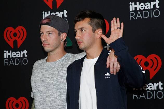 Musical duo Twenty One Pilots arrives for the iHeartRadio Music Festival at the T-Mobile Arena in Las Vegas, Nevada on September 23, 2016.  LVP2016092367 JAMESxATOA