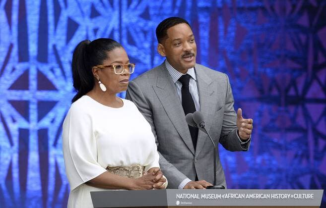 Oprah Winfrey, and Will Smith speak at the opening ceremony of the Smithsonian National Museum of African American History and Culture on September 24, 2016 in Washington, DC. The museum is opening thirteen years after Congress and President George W. Bush authorized its construction. Pool  WAX20160924115 OlivierxDouliery