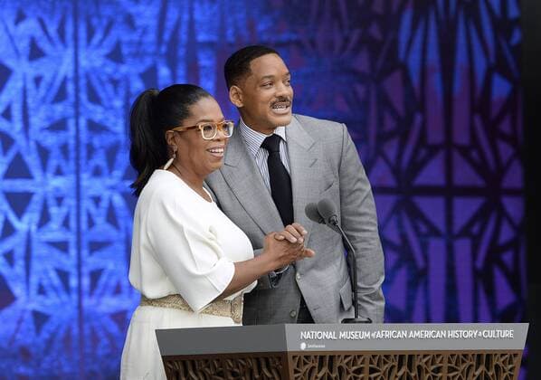 Oprah Winfrey, and Will Smith speak at the opening ceremony of the Smithsonian National Museum of African American History and Culture on September 24, 2016 in Washington, DC. The museum is opening thirteen years after Congress and President George W. Bush authorized its construction. Pool  WAX20160924116 OlivierxDouliery