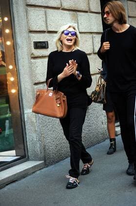 Milan, Amanda Lear in the center for fashion shows Amanda Lear arrives downtown to attend the fashion shows, in the company of a mysterious boy. Here they are walking along Via Montenapoleone.  Copyright: xMimmoxCarrierox
