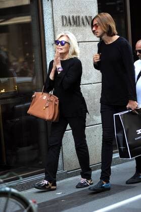 Milan, Amanda Lear in the center for fashion shows Amanda Lear arrives downtown to attend the fashion shows, in the company of a mysterious boy. Here they are walking along Via Montenapoleone.  Copyright: xMimmoxCarrierox