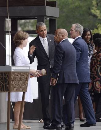 September 24, 2016 - Washington, District of Columbia, United States of America - (L to R) : Former First Lady Laura Bush, United States President Barack Obama, U.S. Representative John Lewis (Democrat of Georgia) and former U.S. President George W. Bush attend the opening ceremony of the Smithsonian National Museum of African American History and Culture on September 24, 2016 in Washington, DC. The museum is opening thirteen years after Congress and President George W. Bush authorized its construction. .Credit: Pool via CNP Washington United States of America - ZUMAs152
