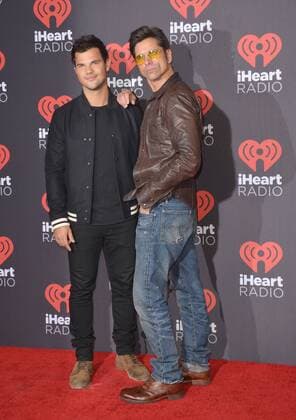 September 24, 2016 - Las Vegas, Nevada, United States of America - Actors Taylor Lautner anf John Stamos attend the iHeartRadio Music Festival on September 24, 2016 at the T-Mobile Arena in Las Vegas, Nevada. Las Vegas United States of America - ZUMAt114