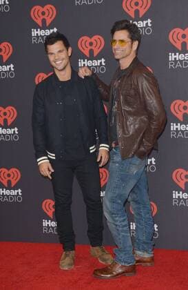 September 24, 2016 - Las Vegas, Nevada, United States of America - Actors Taylor Lautner anf John Stamos attend the iHeartRadio Music Festival on September 24, 2016 at the T-Mobile Arena in Las Vegas, Nevada. Las Vegas United States of America - ZUMAt114