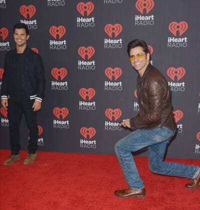 September 24, 2016 - Las Vegas, Nevada, United States of America - Actors Taylor Lautner anf John Stamos attend the iHeartRadio Music Festival on September 24, 2016 at the T-Mobile Arena in Las Vegas, Nevada. Las Vegas United States of America - ZUMAt114