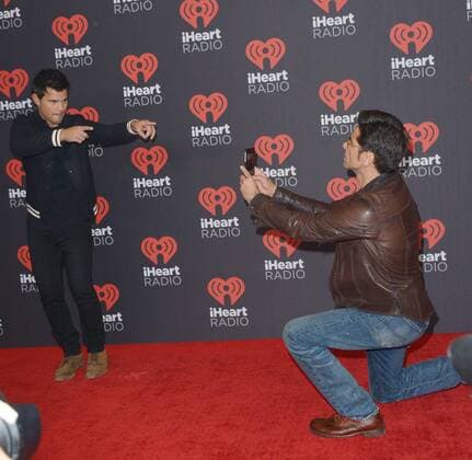 September 24, 2016 - Las Vegas, Nevada, United States of America - Actors Taylor Lautner anf John Stamos attend the iHeartRadio Music Festival on September 24, 2016 at the T-Mobile Arena in Las Vegas, Nevada. Las Vegas United States of America - ZUMAt114