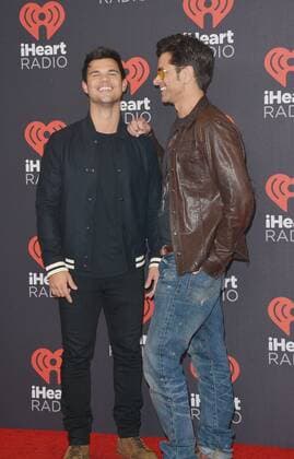 September 24, 2016 - Las Vegas, Nevada, United States of America - Actors Taylor Lautner anf John Stamos attend the iHeartRadio Music Festival on September 24, 2016 at the T-Mobile Arena in Las Vegas, Nevada. Las Vegas United States of America - ZUMAt114