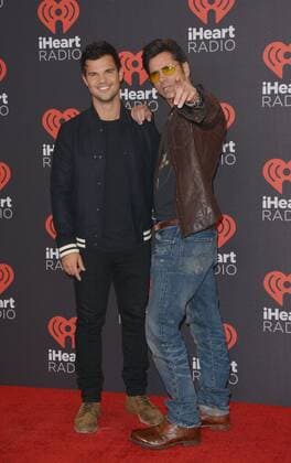 September 24, 2016 - Las Vegas, Nevada, United States of America - Actors Taylor Lautner anf John Stamos attend the iHeartRadio Music Festival on September 24, 2016 at the T-Mobile Arena in Las Vegas, Nevada. Las Vegas United States of America - ZUMAt114